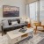 a living room with a couch and a table