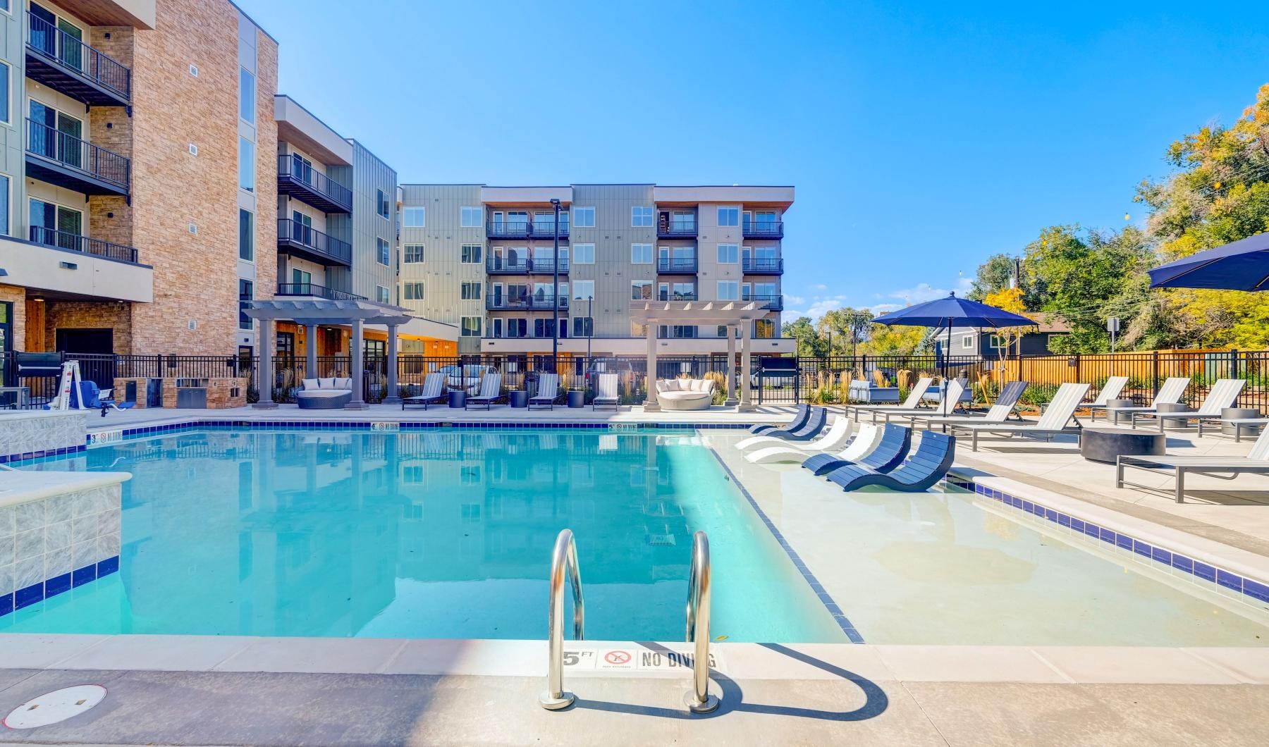 Resort-style swimming pool a swimming pool in a courtyard